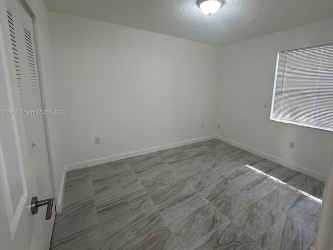 Building Photo - 10833 NW 7th St