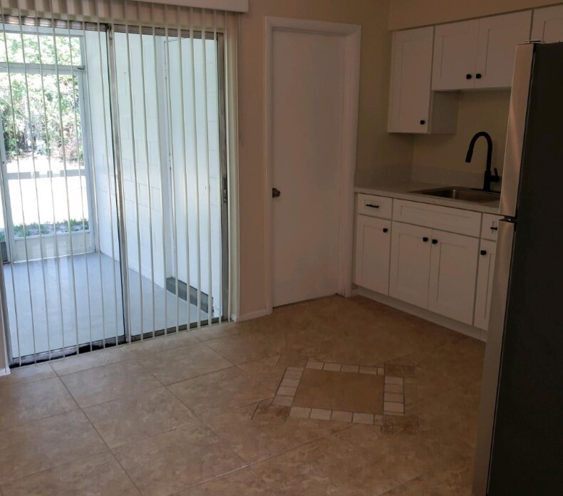 New Tile Floor throughout. - 745 Lunar Lake Cir