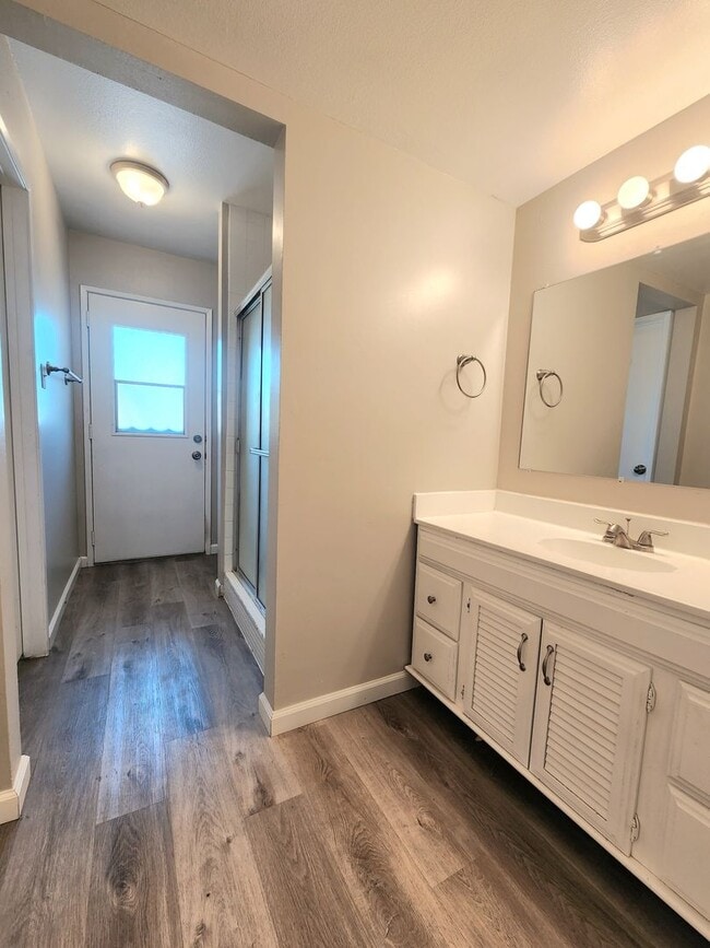 Building Photo - 4 Bedroom Two-Story Home with Downstairs Primary Bedroom & Fireplace