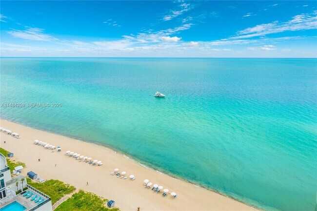 Building Photo - 15811 Collins Ave