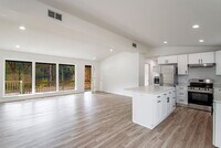 Building Photo - Large Open-Concept 4 Bedroom with Stunning Pond Views!