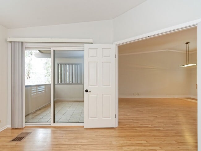 Building Photo - Water, Sewer, Trash Included! Fireplace, Washer, Dryer, 2 Assigned Parking, Garage, Open Floor Pl...