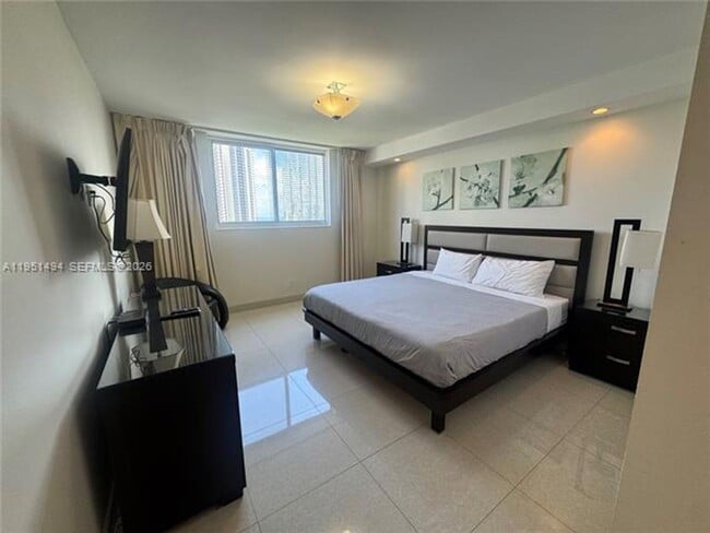 Building Photo - 19370 Collins Ave