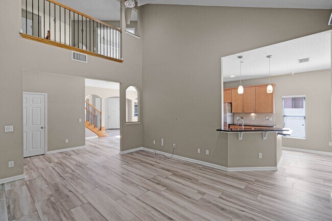 Building Photo - 4/2.5/2 Woodland Lakes Preserve Available Now