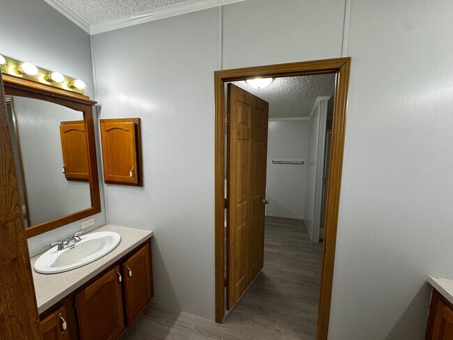 Building Photo - Very large yard great location a nice older doublewide Home