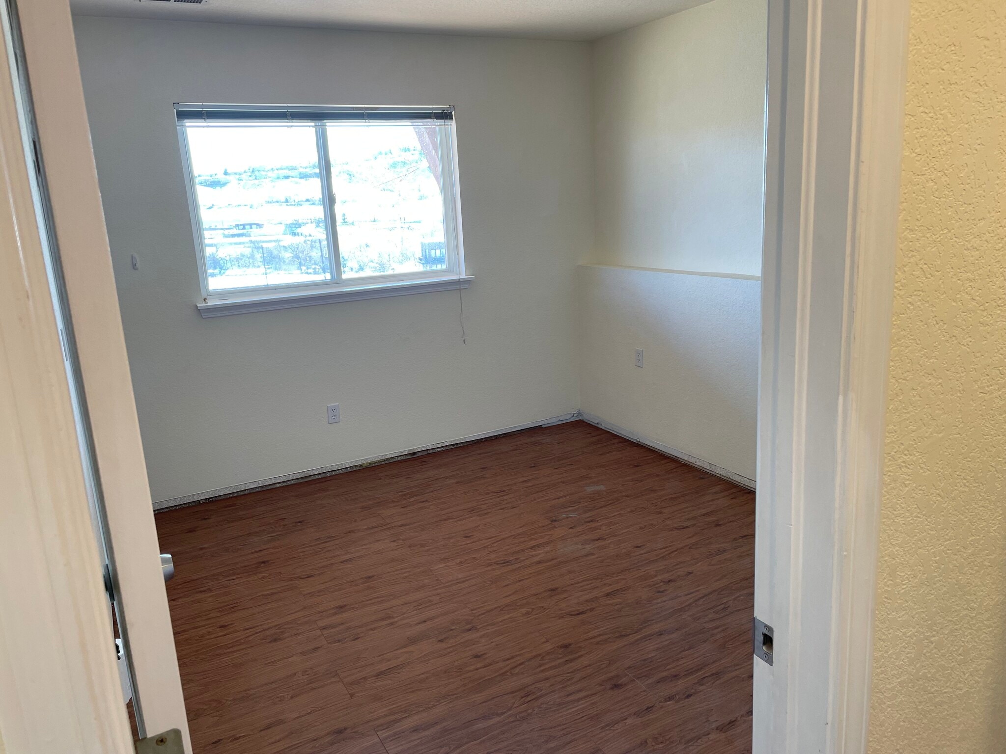 Lower floor bedroom 2 w/walk in closet (new trim being installed) - 535 Canyon View Drive