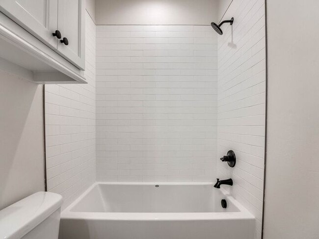 Building Photo - Luxury, Zero Maintenance Living Townhome