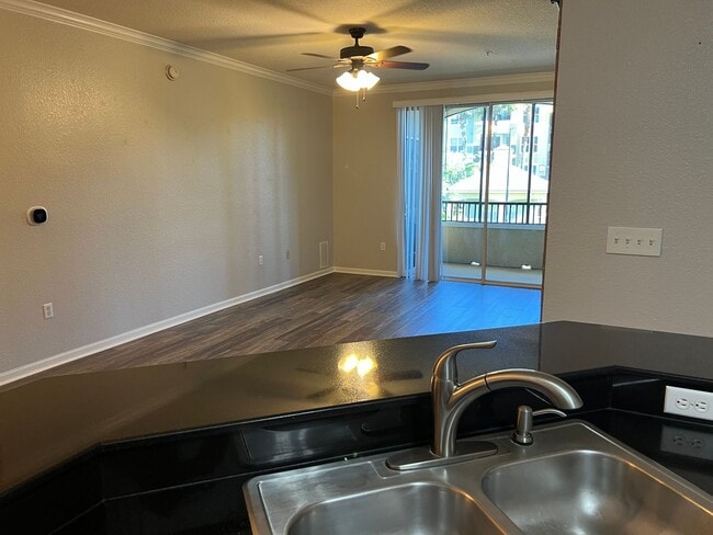 Building Photo - Spacious 3BR/2BA Gated Condo with Resort-Style Amenities!