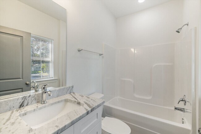 Building Photo - 5/5.5 Townhomes, Built 2024, Walk to stadi...