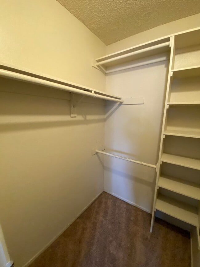 Building Photo - 2 BR 2 BA Corner Condo w/Balcony W/D Gated Entry Carport + Space