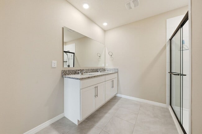 Building Photo - Three Bedroom, 2 Bathroom single family home with 2 Car Garage.