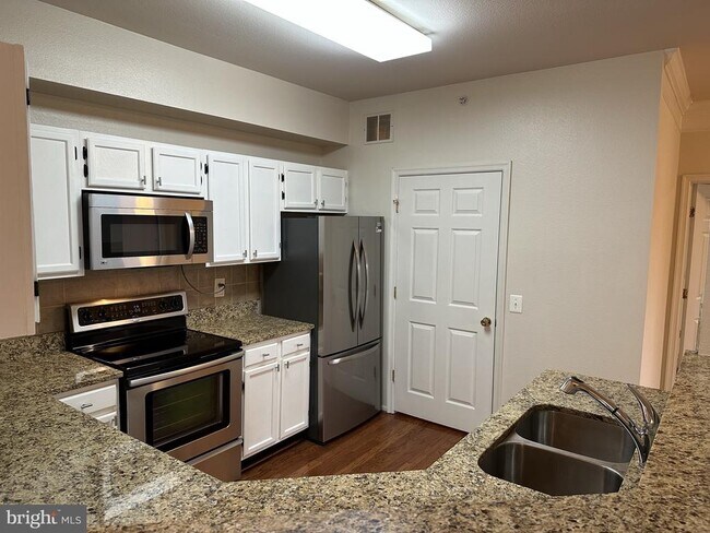 Building Photo - 1550 Spring Gate Dr.