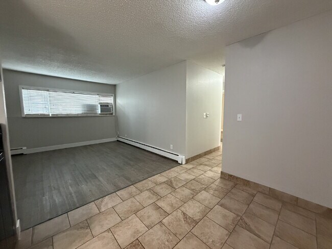 Building Photo - Updated & Clean 2BR Condo - Utilities Included - Laundry, Parking & Pool