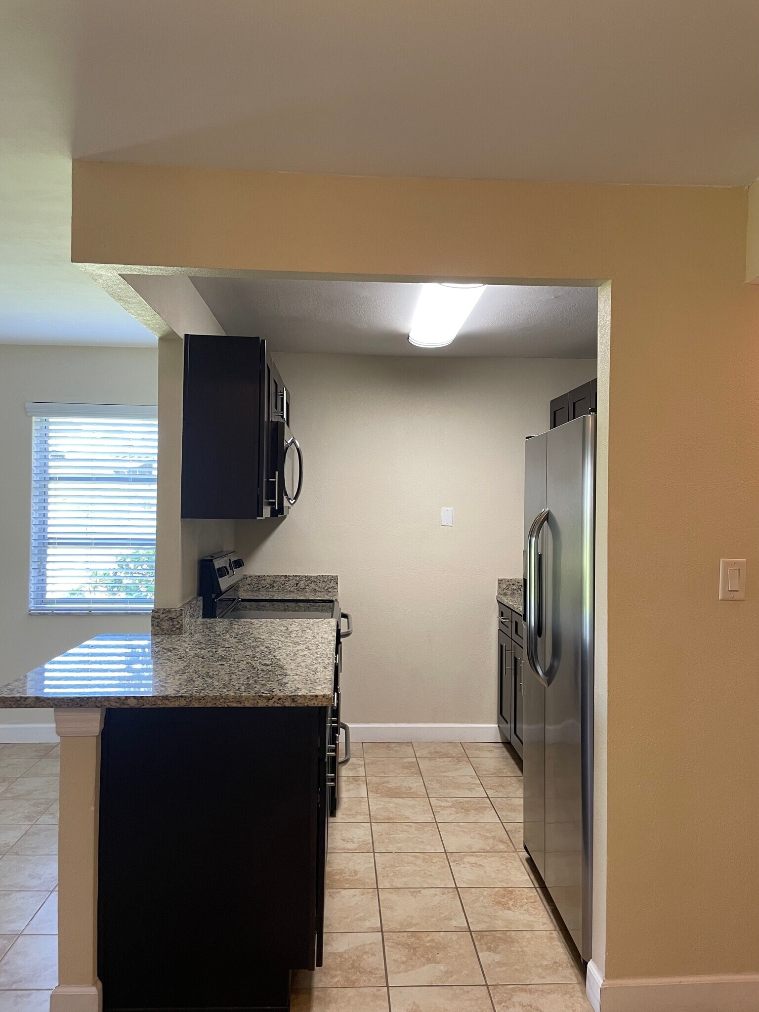 Kitchen - Granite Counter Tops - Frigidaire Kitchen Suite - 213 S McMullen Booth Rd