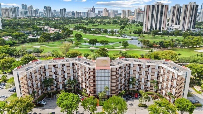 Building Photo - 3301 N Country Club Dr