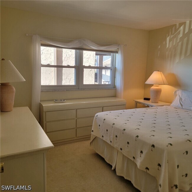 Building Photo - 4912 Tamiami Trl E