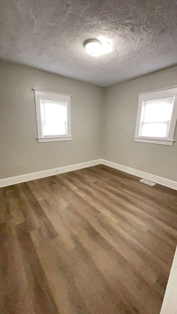 Building Photo - Fully Renovated, 2 BR/1BA Home! Fenced In Yard! Deck! 1-Car Garage! Off Street Parking!