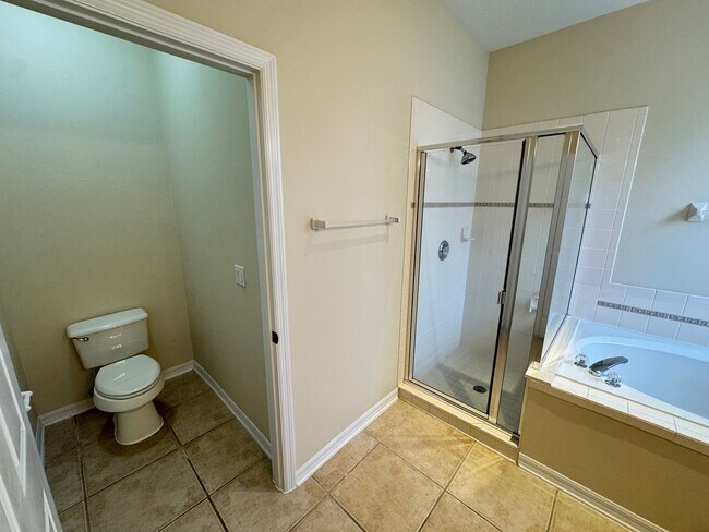 Building Photo - Spacious 4-Bedroom Home with Private Pool and Modern Comforts