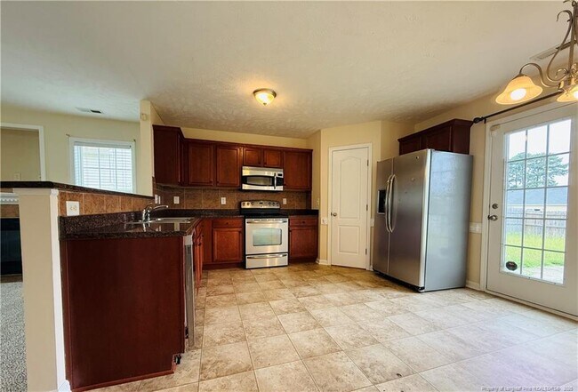 Building Photo - 5326 Woodpecker Dr