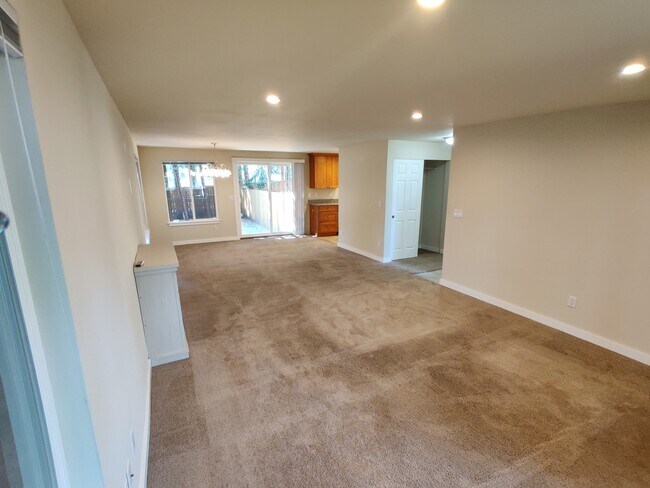 Spacious and lighted Living and Dining Area with fireplace - 17729 NE 88th Pl