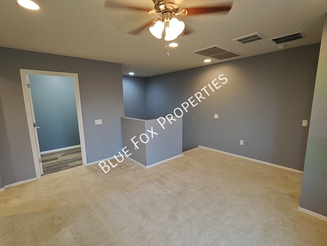 Building Photo - 10947 E Passion Flower Ln