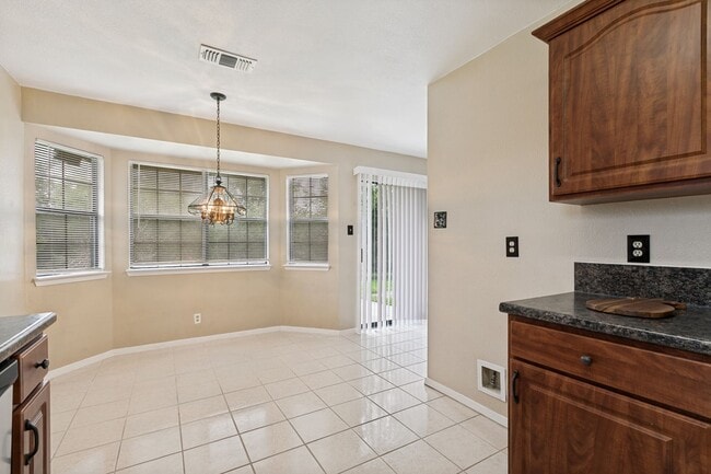Building Photo - 6991 Sunset Village Dr