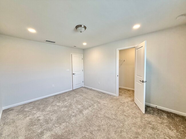 Building Photo - Stunning End Unit 3BD, 2.5BA Wendell Townhome with a 2-Car Garage in a Gorgeous HOA Community wit...