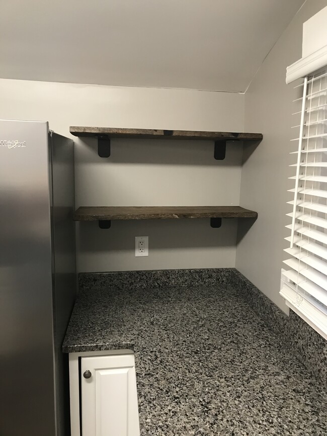 Barn wood floating shelves - 204 Spring St