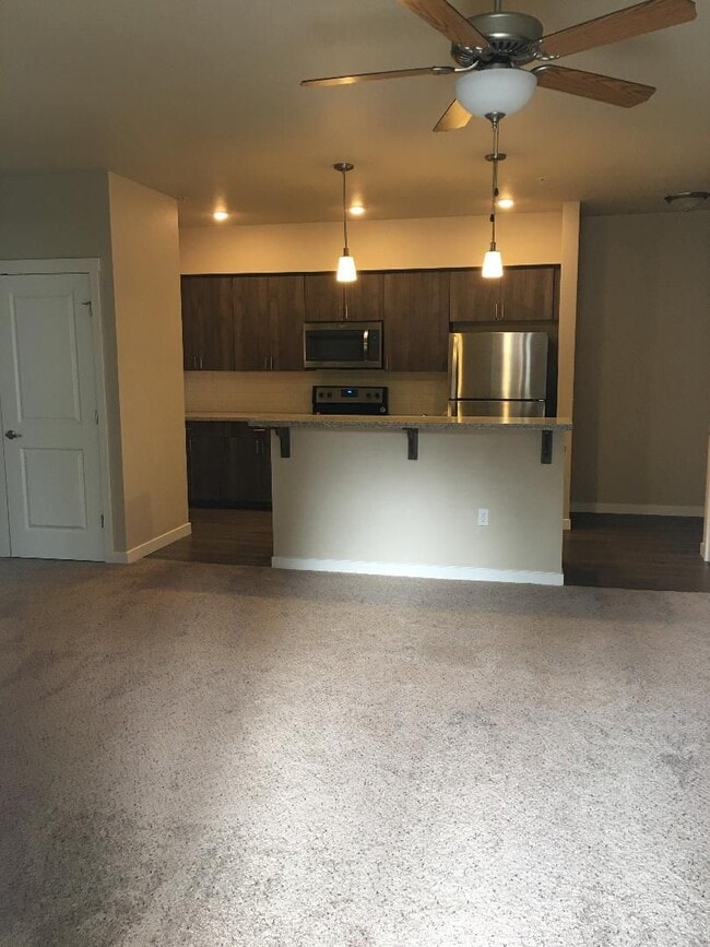 Building Photo - Stunning 1-Bedroom with Upscale Interiors & Open Island Kitchen!