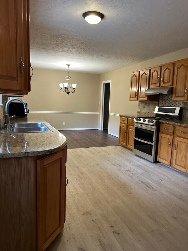 Kitchen with eat in dining area - 2613 6th St NW