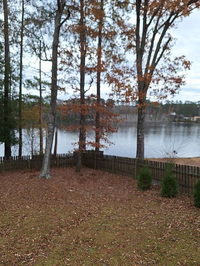 Building Photo - Well- maintained 4 bedroom home on the lake