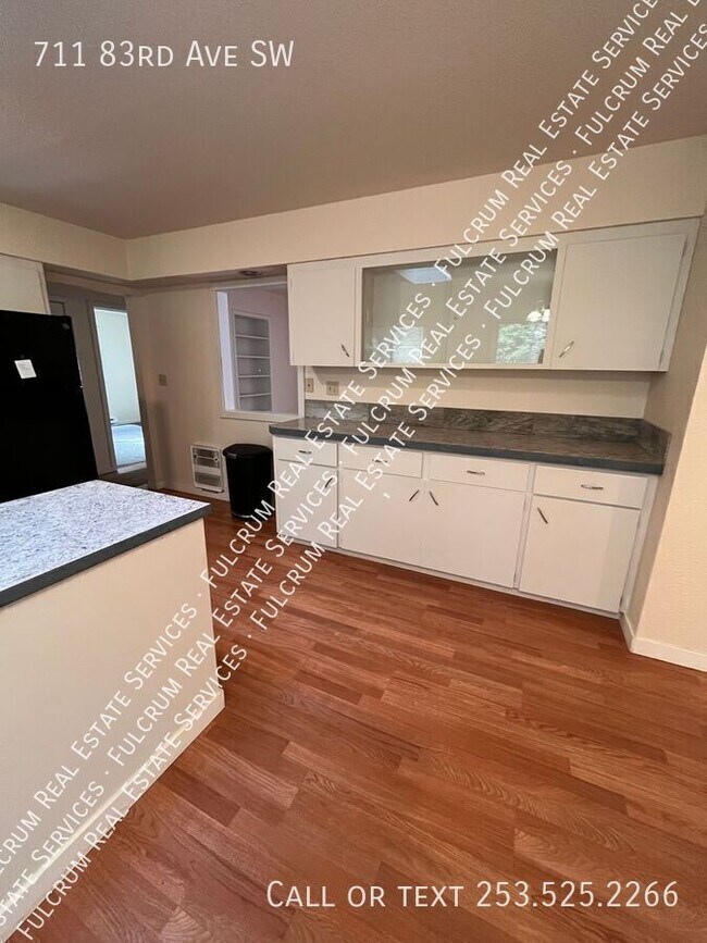 Building Photo - 711 83rd Ave SW