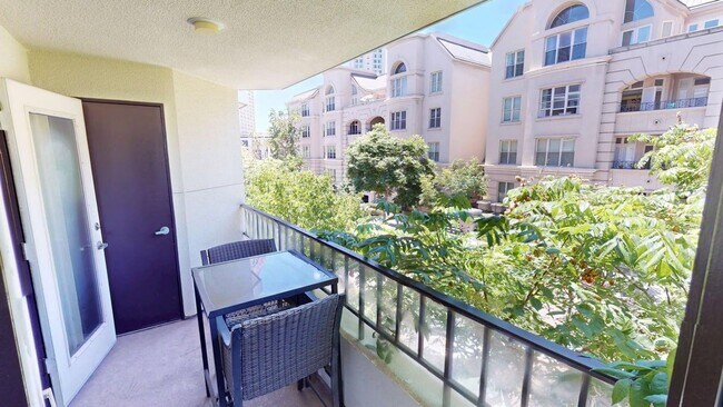 Building Photo - Upgraded 2bd/2Ba Mariana District Condo - ...