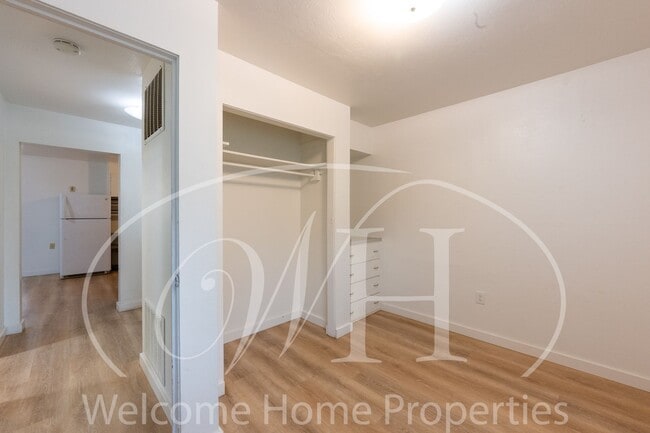 Building Photo - Comfortable 3-Bedroom Home with Fenced Yard and Attached Carport