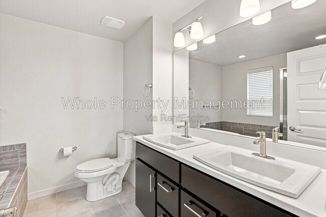 Building Photo - 9004 E 49th Pl