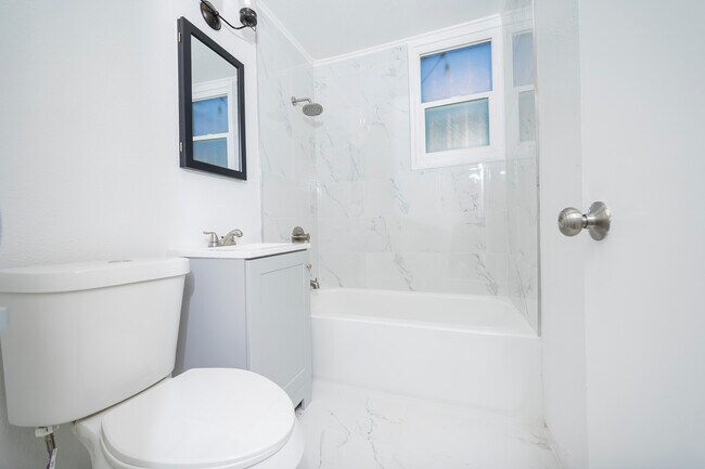 Newly Remodelled Bathroom - 4499 Campus Ave