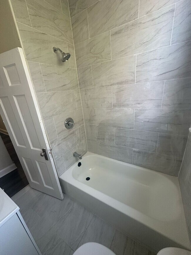 Building Photo - BRAND NEW 2 BEDROOM 1 BATH FIRST FLOOR APARTMENT