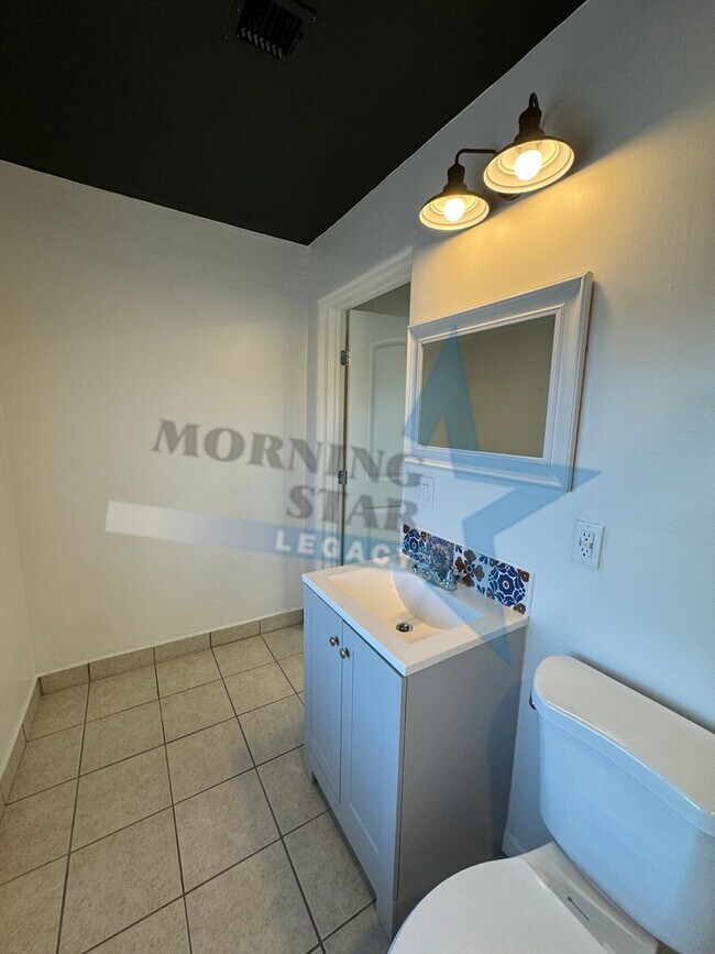 Building Photo - Charming Updated Home w/ Enclosed Yard & Storage