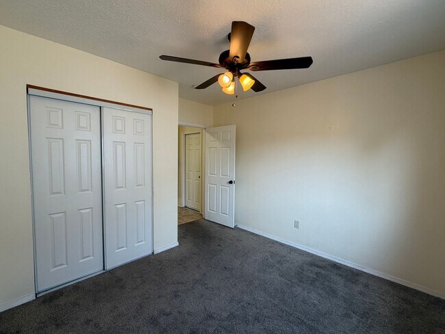 Building Photo - Spacious 4 Bedroom 2 Bathroom Home In The NE Heights!