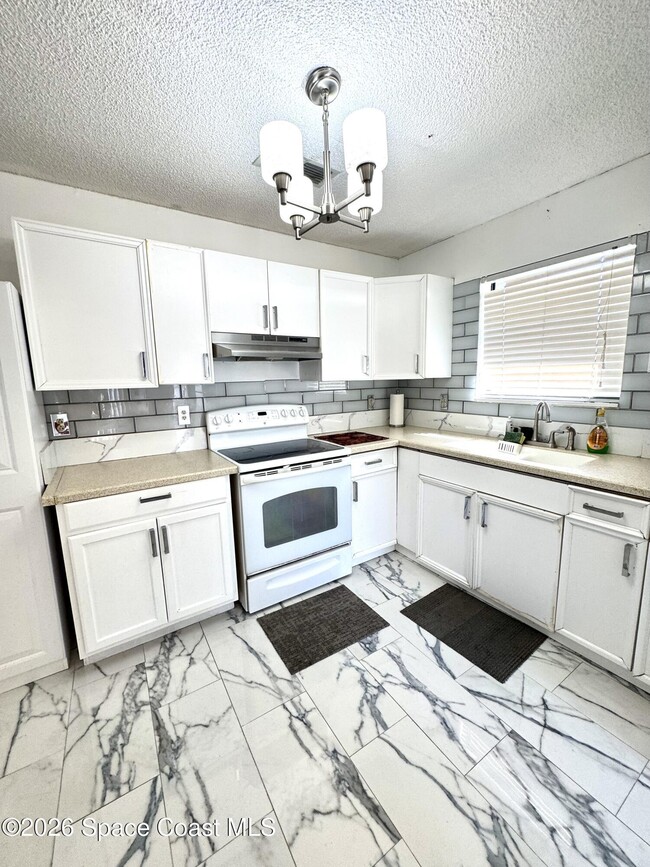 Building Photo - 885 Taluga Ave SE