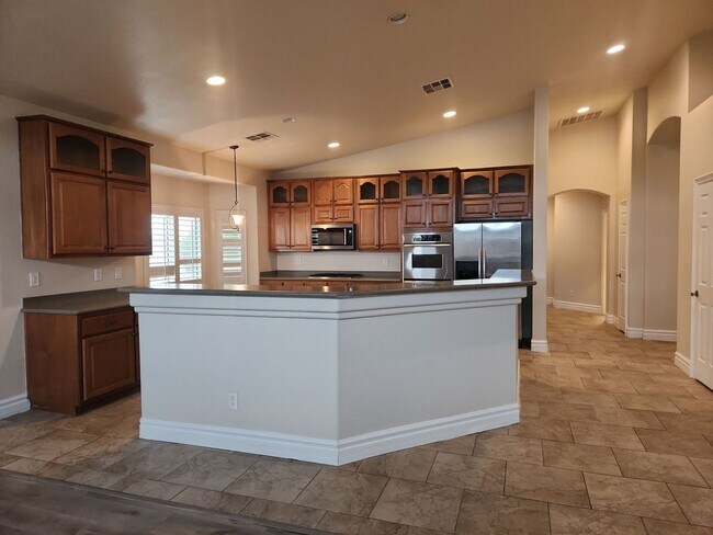 Building Photo - A Stunning 4 Bedroom Home with a Sparkling Pool