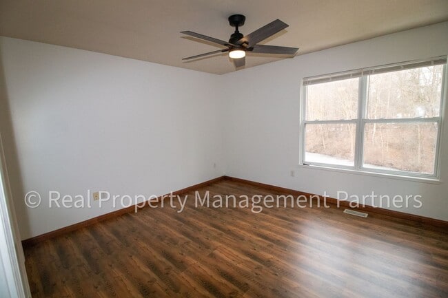 Building Photo - Forest Hills 3 Bed Townhome with Garage, Pond View and Some Utilities Included