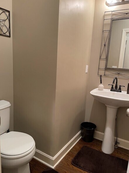 Half Bath by Garage Entry - 13846 W 154th Ter