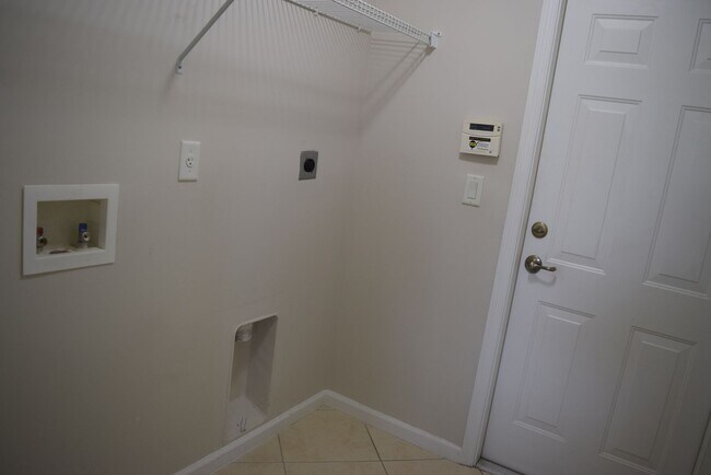 Building Photo - Stunning upgraded and immaculately maintained 3/2/2 home close to Gatlin I-95