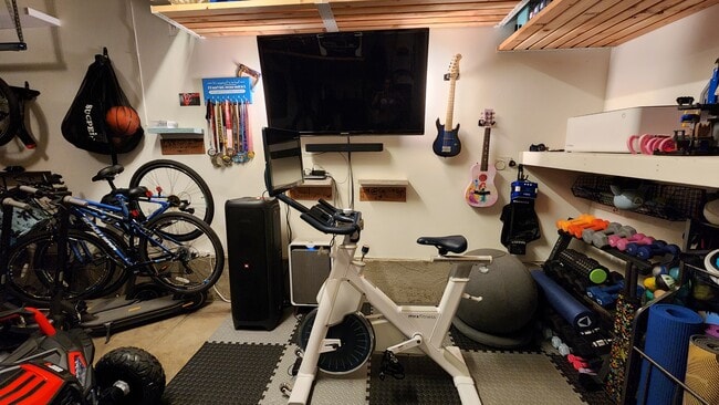 The garage is packed with bikes, scooters, and more! Use for enjoyment of the trails and parks. - 1106 Ansel