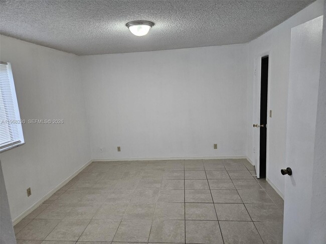 Building Photo - 3300 Pinewalk Dr N