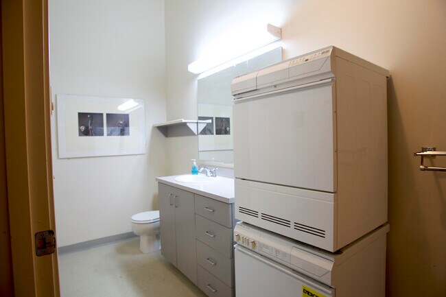 Bathroom showing washer/dryer - 1314 NW Irving St