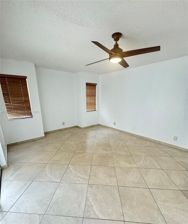 Building Photo - 3111 Coral Springs Dr