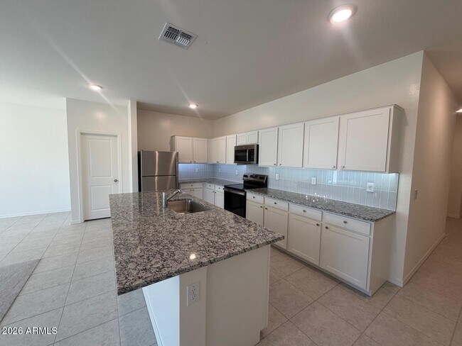 Building Photo - 4422 N 100th Dr