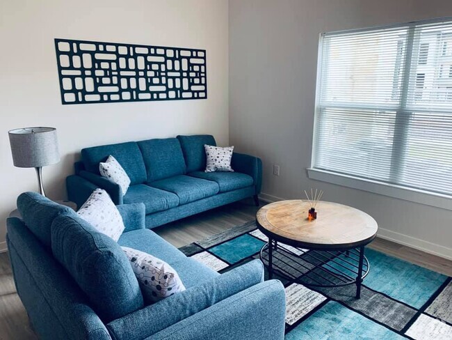 Living Area with Large Double-Paned Windows - Mission Trail at El Camino Real